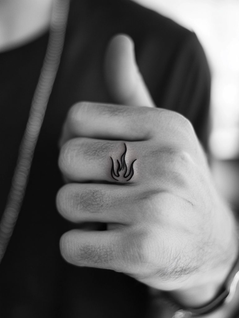 mens tattoo ideas roman Flame Tiny linework