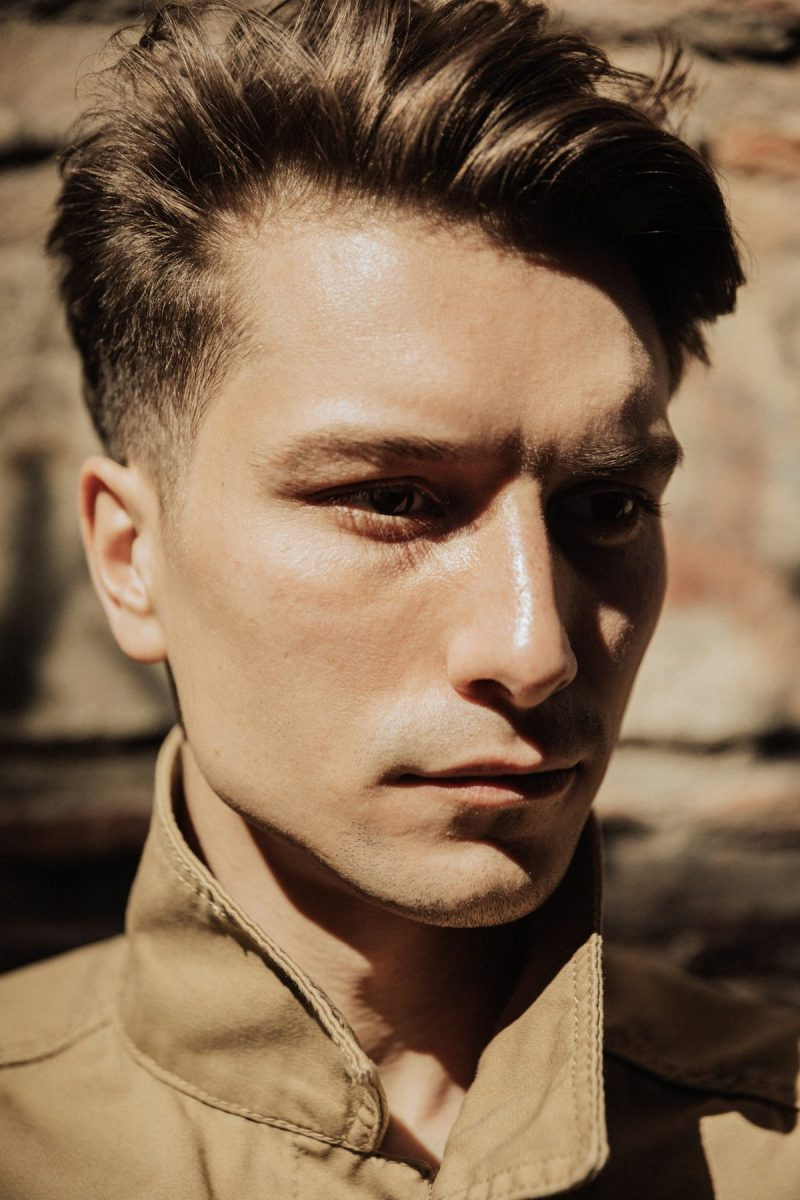 Man with a textured short crop and soft faded sides