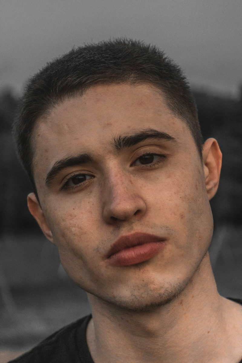 Man with a short clean crop haircut portrait